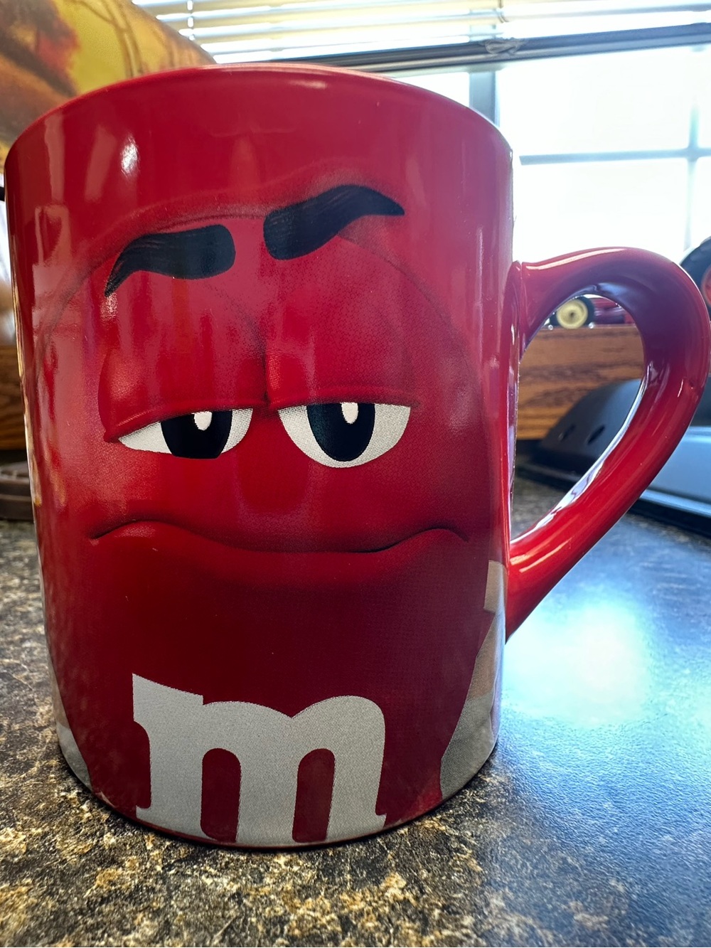 Red M&M character 16 oz novelty collectors mug. Trust me I’m sweeter than I look